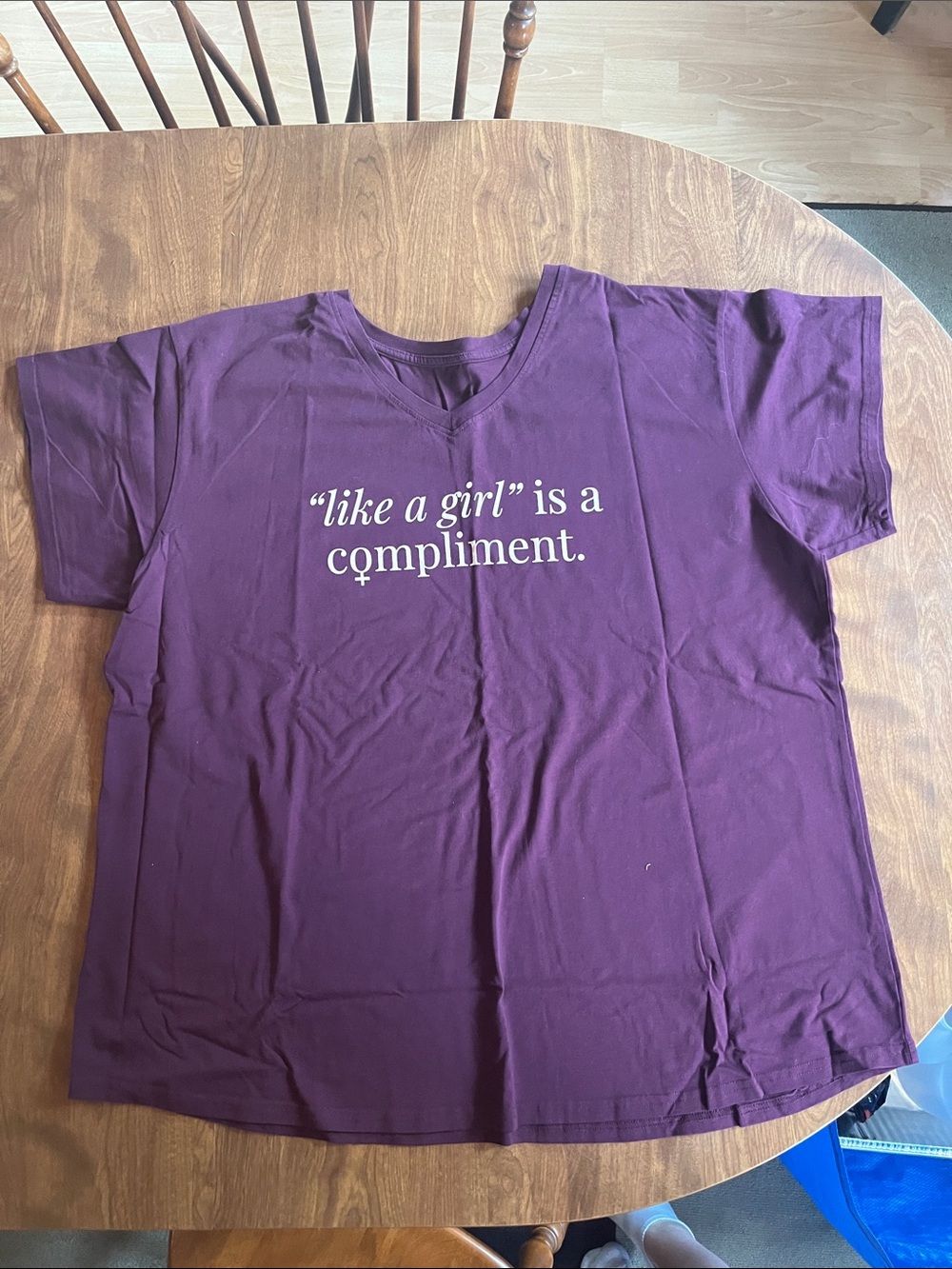 Sseko Purple V-Neck Short Sleeve Tee with White Text